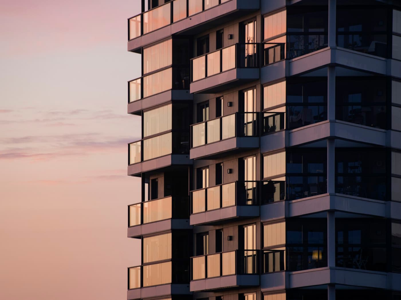 A low-rise multi-family residential building with balconies in North County San Diego (stock photograph, not a Craft Homes project)